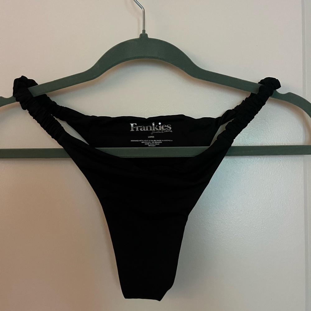 Frankie’s high cut black bikini bottom.